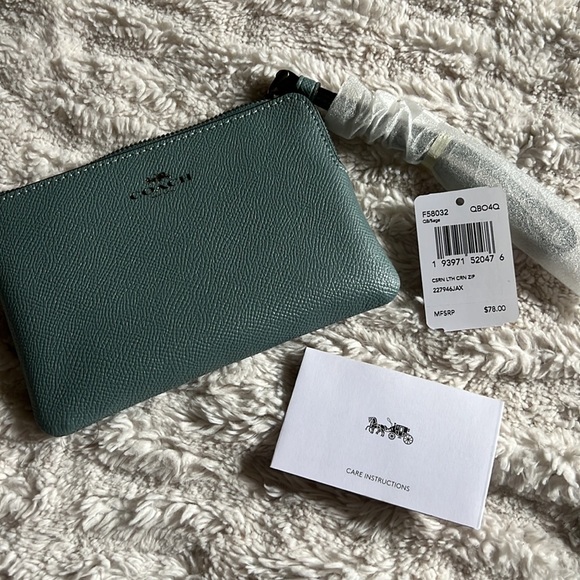 Coach Handbags - Coach light blue wristlet wallet